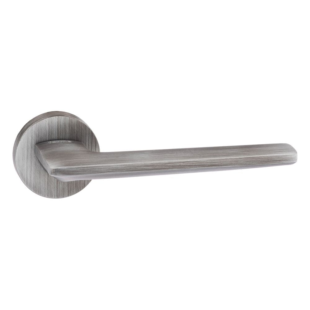 High quality image of Forme Boston Designer Lever on Minimal Round Rose - Urban Graphite | Sku. fmr422ug | available to order from Trade Door Handles in Kendal.