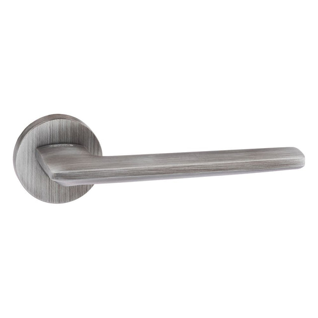 High quality image of Forme Boston Designer Lever on Minimal Round Rose - Urban Graphite | Sku. fmr422ug | available to order from Trade Door Handles in Kendal.