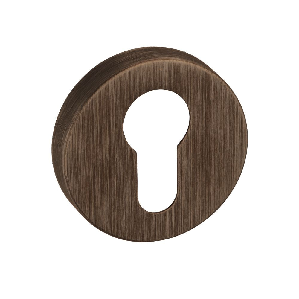 This is an image of Forme Euro Escutcheon on Minimal Round Rose - Urban Bronze available to order from Trade Door Handles.