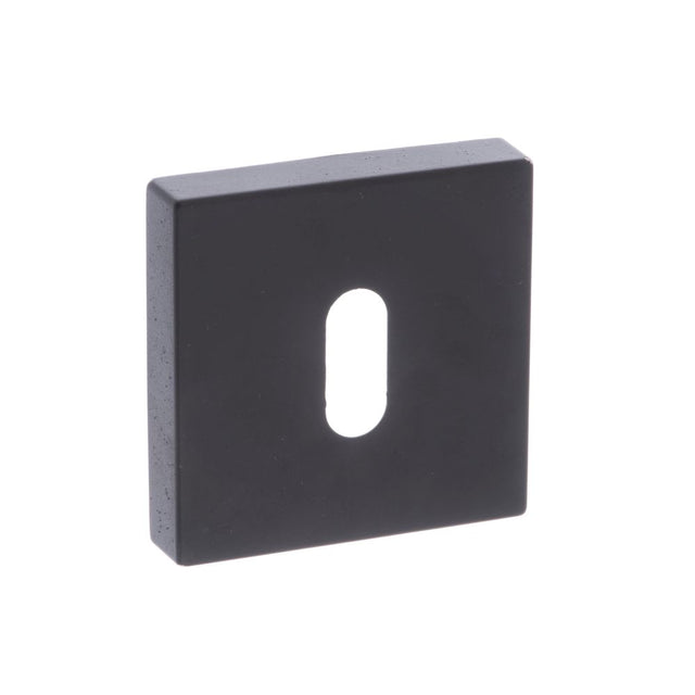 This is an image of Forme Key Escutcheon on Minimal Square Rose - Matt Black available to order from Trade Door Handles.