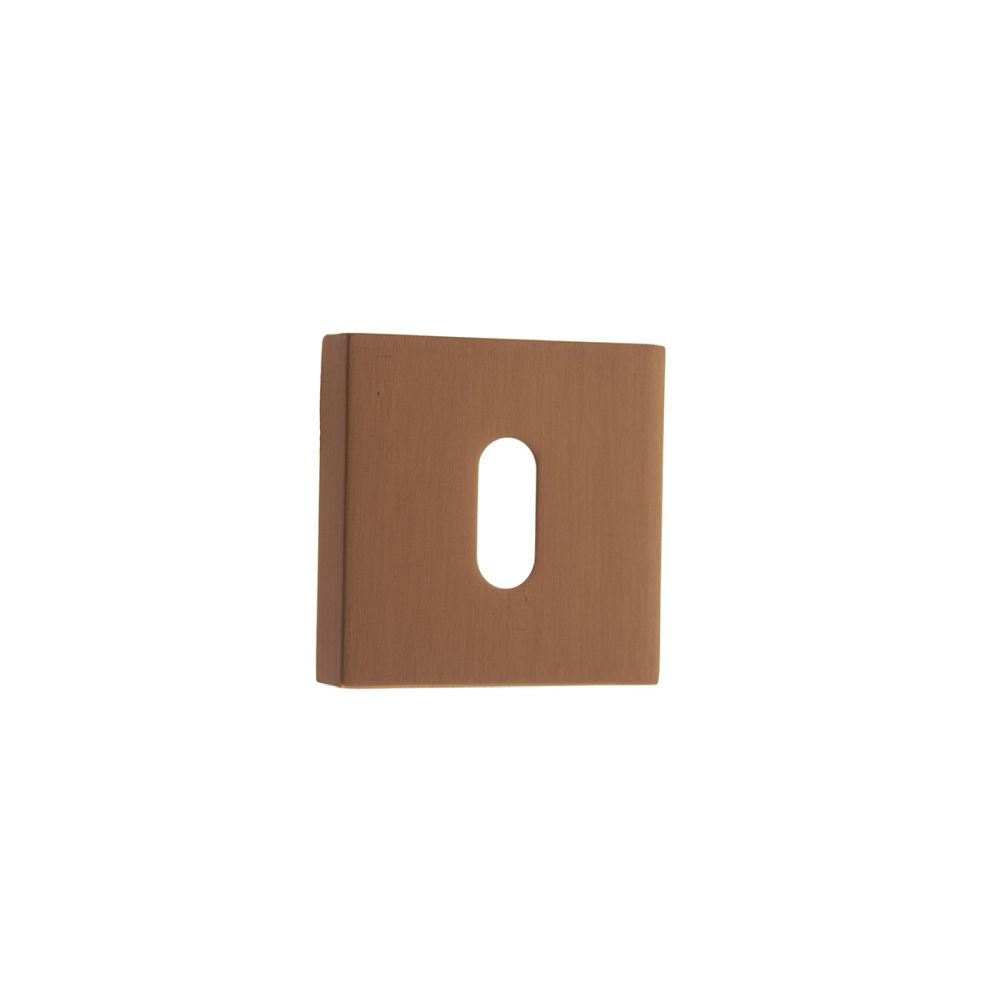 This is an image of Forme Key Escutcheon on Minimal Square Rose - Urban Satin Copper available to order from Trade Door Handles.