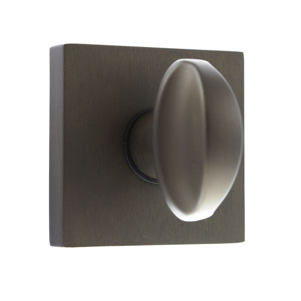 This is an image of Forme WC Turn and Release on Minimal Square Rose - Urban Dark Bronze available to order from Trade Door Handles.