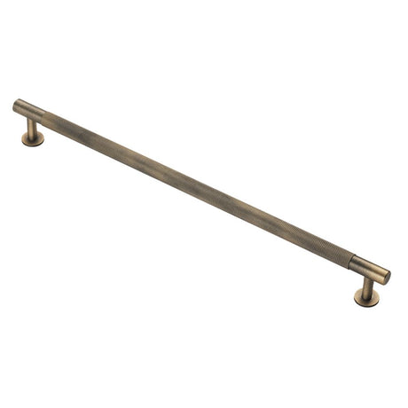 This is an image of a FTD - Knurled Pull Handle 320mm c/c - Antique Brass that is availble to order from Trade Door Handles in Kendal.