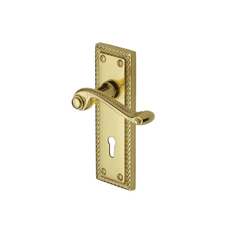 This is an image of a Heritage Brass - Door Handle Lever Lock Georgian Design Polished Brass Finish, g040-pb that is available to order from Trade Door Handles in Kendal.