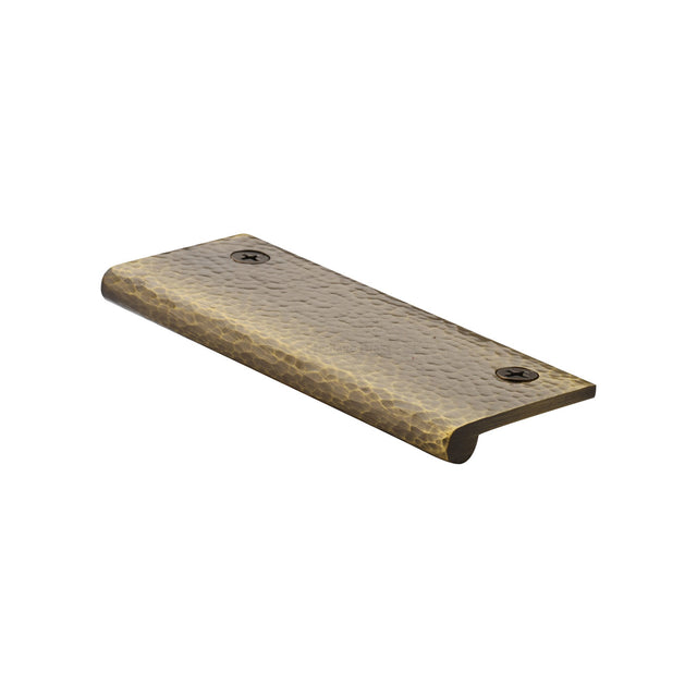 This is an image of a Heritage Brass - Hammered EP Edge Pull Cabinet Handle 100mm Antique Brass finish, ham100-38-at that is available to order from Trade Door Handles in Kendal.