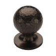 This is an image of a Heritage Brass - Cabinet Knob Ball Hammered Design 32mm Matt Bronze finish, ham8321-32-mb that is available to order from Trade Door Handles in Kendal.