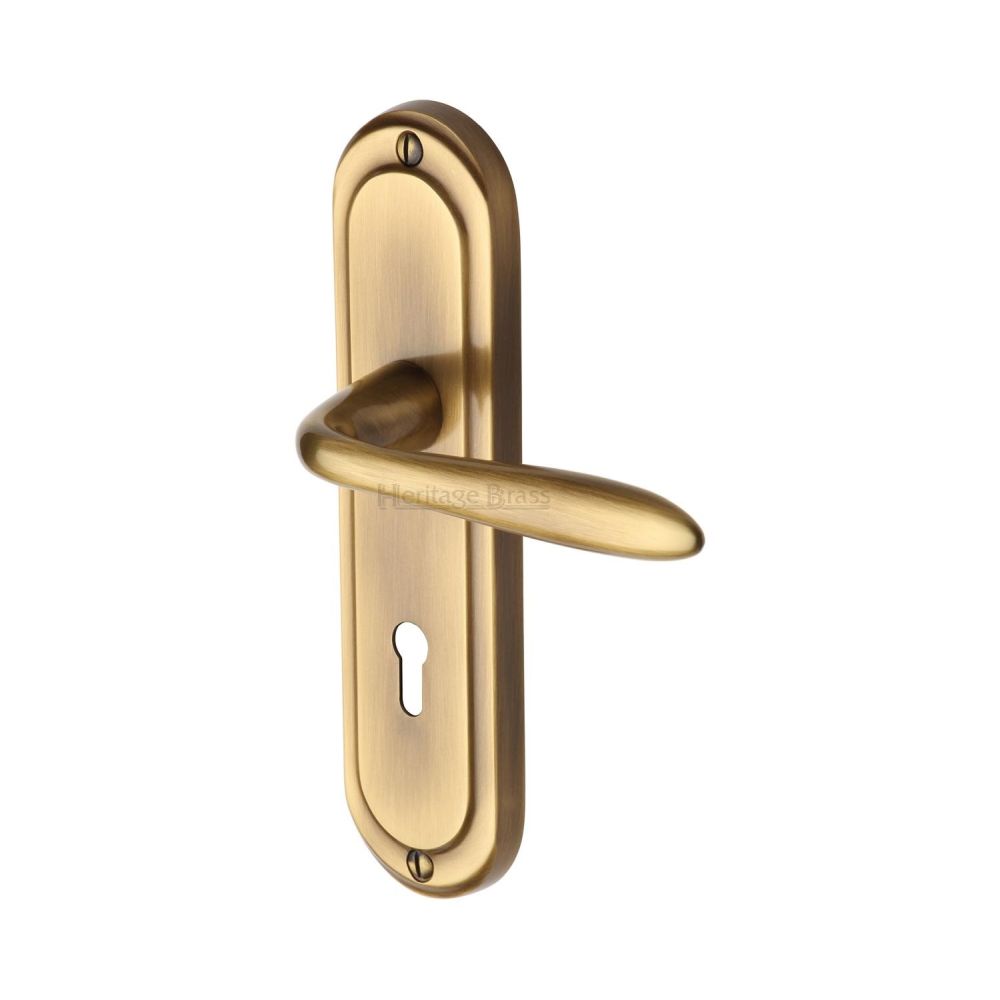 This is an image of a Heritage Brass - Door Handle Lever Lock Henley Design Antique Brass Finish, hen1200-at that is available to order from Trade Door Handles in Kendal.