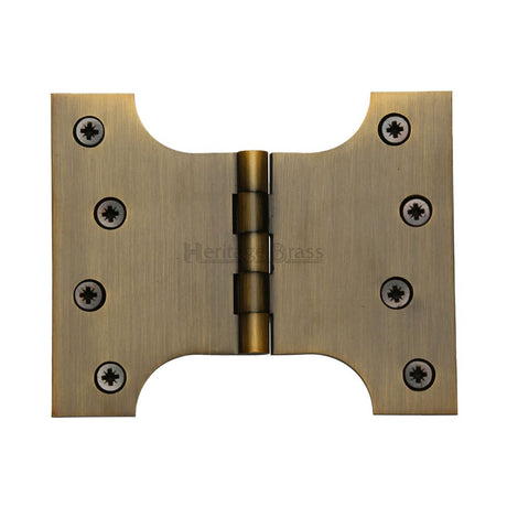 This is an image of a Heritage Brass - Parliament Hinge Brass 4" x 3" x 5" Antique Brass Finish, hg99-390-at that is available to order from Trade Door Handles in Kendal.