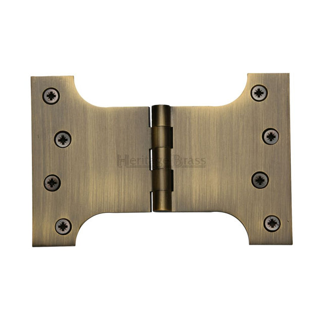 This is an image of a Heritage Brass - Parliament Hinge Brass 4" x 4" x 6" Antique Brass Finish, hg99-395-at that is available to order from Trade Door Handles in Kendal.