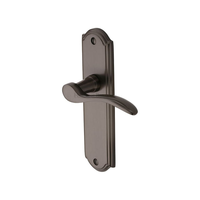 This is an image of a Heritage Brass - Door Handle Lever Latch Howard Design Matt Bronze Finish, how1310-mb that is available to order from Trade Door Handles in Kendal.