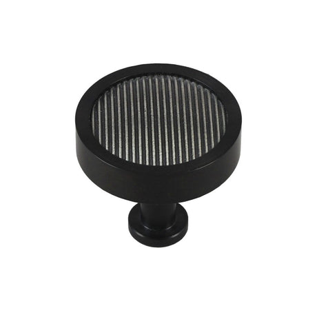 This is an image showing Finesse Immix Reed Cupboard Knob - Pewter/True Black available from trade door handles, quick delivery and discounted prices.