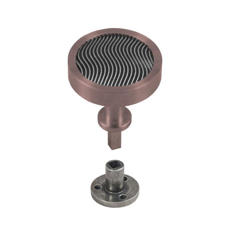 This is an image showing Finesse Immix Spiral Cupboard Knob (Anti Rotation) - Pewter/Bronze available from trade door handles, quick delivery and discounted prices.