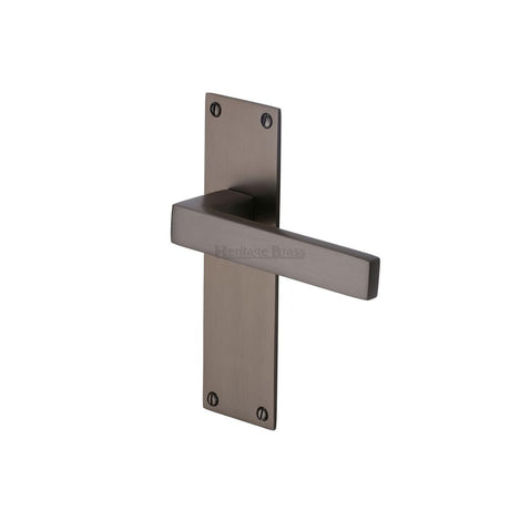 This is an image of a Heritage Brass - Door Handle Lever Latch Metro Design Matt Bronze Finish, met4910-mb that is available to order from Trade Door Handles in Kendal.