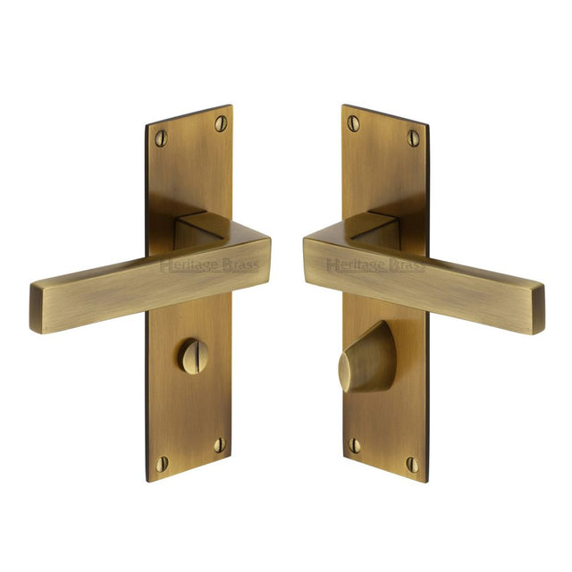 This is an image of a Heritage Brass - Door Handle for Bathroom Metro Design Antique Brass Finish, met4930-at that is available to order from Trade Door Handles in Kendal.