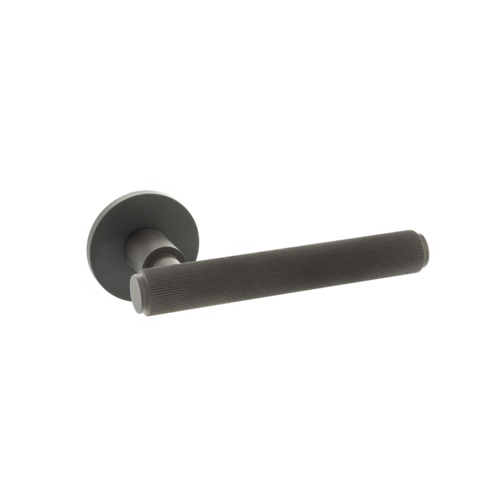 High quality image of Millhouse Brass Stephenson Designer Lever on 5mm Slimline Round Rose - Urban Dar | Sku. mhsr250udb available to order from Trade Door Handles in Kendal.