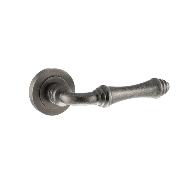 This is an image of Old English Durham Lever on Round Rose - Distressed Silver available to order from Trade Door Handles.