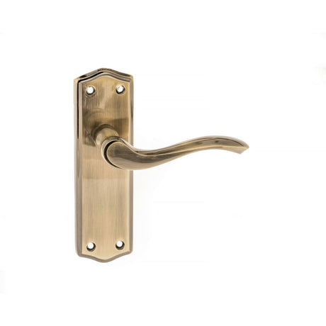 This is an image of Old English Warwick Latch Lever on Backplate - Antique Brass available to order from Trade Door Handles.