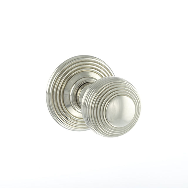 This is an image of Old English Ripon Solid Brass Reeded Mortice Knob on Concealed Fix Rose - Polish available to order from Trade Door Handles.