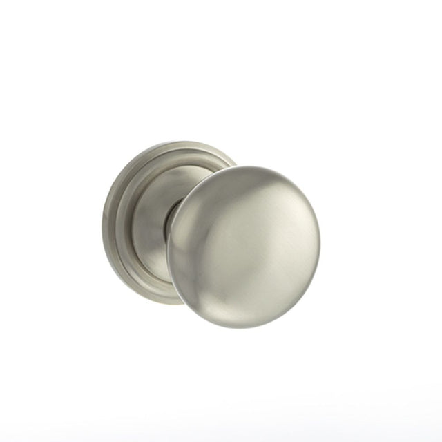 This is an image of Old English Harrogate Solid Brass Mushroom Mortice Knob on Concealed Fix Rose - available to order from Trade Door Handles.