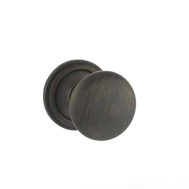 This is an image of Old English Harrogate Solid Brass Mushroom Mortice Knob on Concealed Fix Rose - available to order from Trade Door Handles.