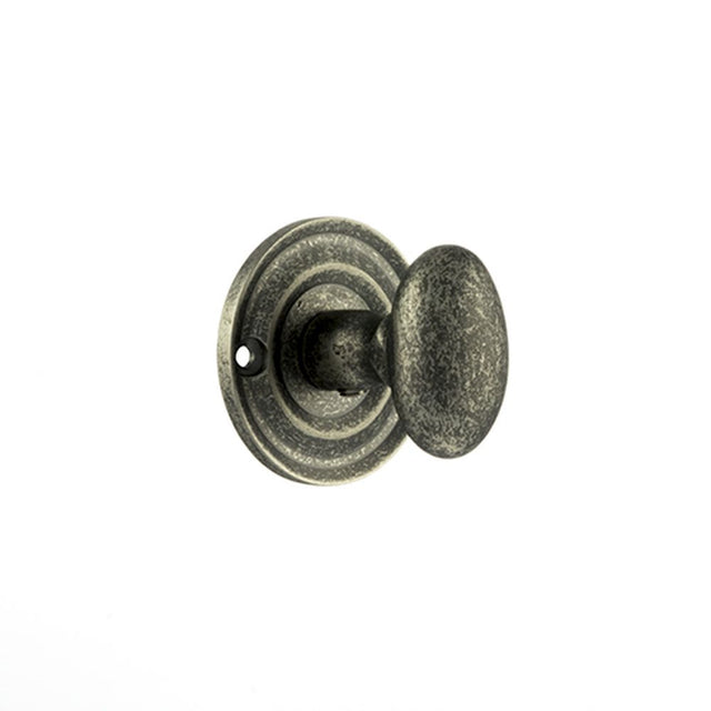 This is an image of Old English Solid Brass Oval WC Turn and Release - Distressed Silver available to order from Trade Door Handles.