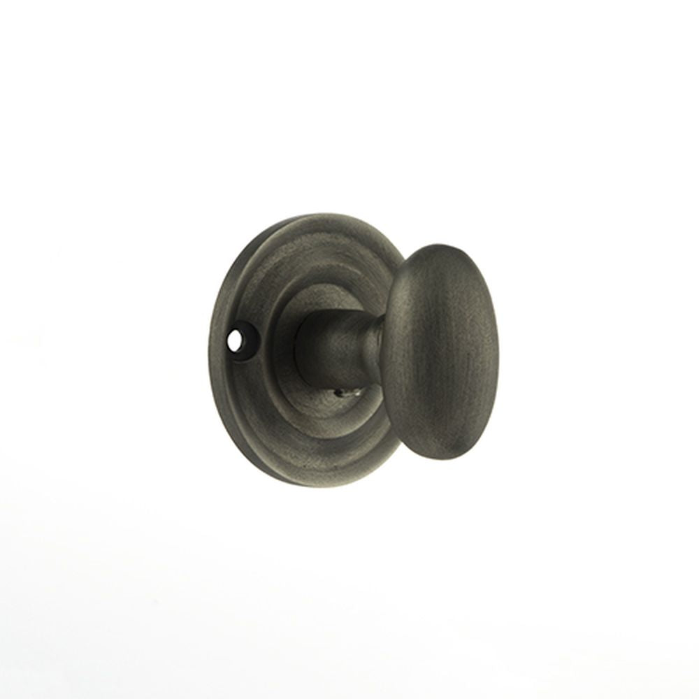 This is an image of Old English Solid Brass Oval WC Turn and Release - Matt Gun Metal available to order from Trade Door Handles.