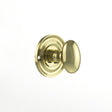 This is an image of Old English Solid Brass Oval WC Turn and Release - Polished Brass available to order from Trade Door Handles.