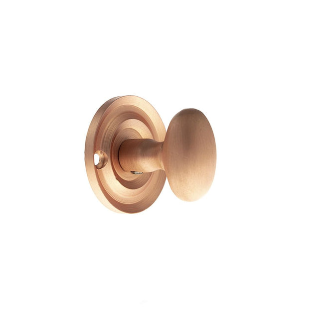 This is an image of Old English Solid Brass Oval WC Turn and Release - Urban Satin Copper available to order from Trade Door Handles.