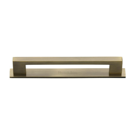 This is an image of a Heritage Brass - Cabinet Pull Metro Design with Plate 160mm CTC Antique Brass Finis, pl0337-160-at that is available to order from Trade Door Handles in Kendal.