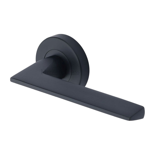 This is an image of a Heritage Brass - Door Handle Lever Latch on Round Rose Pyramid Design Matt Black, pyd3535-bkmt that is available to order from Trade Door Handles in Kendal.