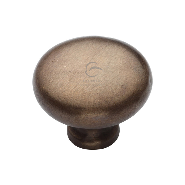 This is an image of a M.Marcus - Bronze Rustic Cabinet Knob Round Design 38mm, rbl117-38 that is available to order from Trade Door Handles in Kendal.