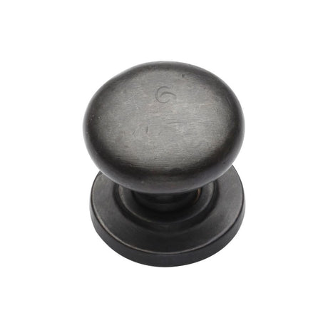 This is an image of a M.Marcus - Rustic Dark Bronze Cabinet Knob Round Design on Rose 32mm, rdb613-32 that is available to order from Trade Door Handles in Kendal.