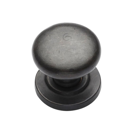 This is an image of a M.Marcus - Rustic Dark Bronze Cabinet Knob Round Design on Rose 38mm, rdb613-38 that is available to order from Trade Door Handles in Kendal.