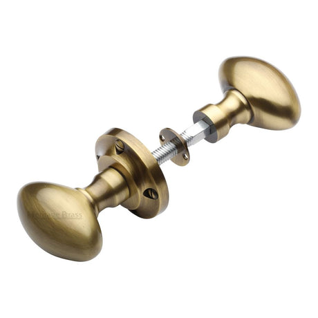 This is an image of a Heritage Brass - Suffolk Rim Knob Antique Brass Finish, rim-v960-at that is available to order from Trade Door Handles in Kendal.