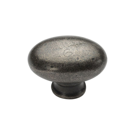 This is an image of a M.Marcus - Rustic Pewter Cabinet Knob Oval Design 32mm, rpw118-32 that is available to order from Trade Door Handles in Kendal.