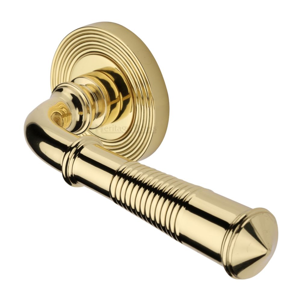 This is an image of a Heritage Brass - Door Handle Lever Latch on Round Rose Bridgetown Reeded Design, rr1935-pb that is available to order from Trade Door Handles in Kendal.