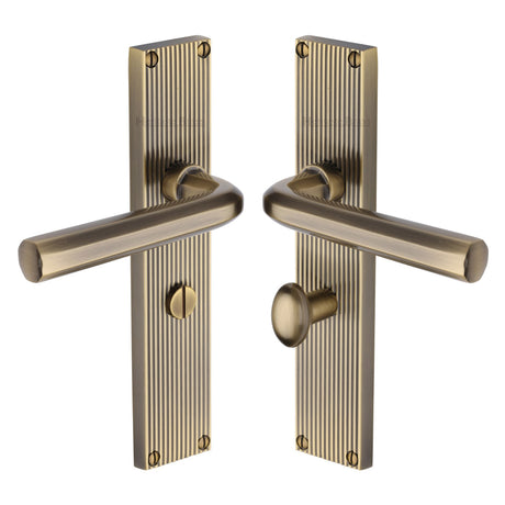 This is an image of a Heritage Brass - Octave Reeded Bathroom Set Antique Brass finish, rr3730-at that is available to order from Trade Door Handles in Kendal.