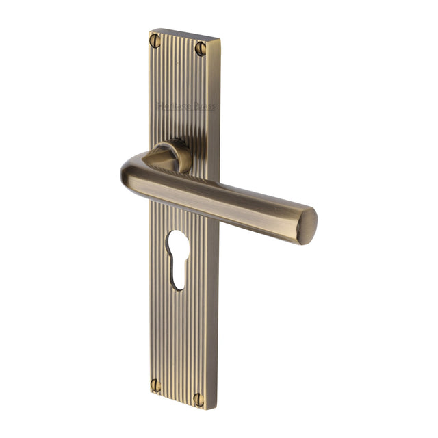 This is an image of a Heritage Brass - Octave Reeded Europrofile Antique Brass finish, rr3748-at that is available to order from Trade Door Handles in Kendal.