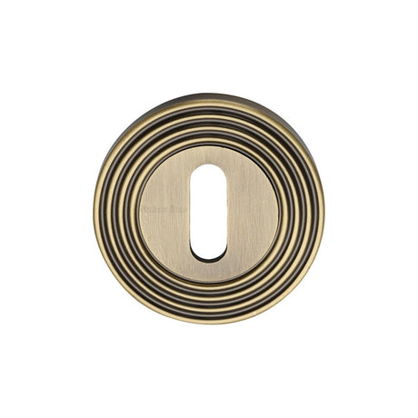 High quality image of Heritage Brass - Key Escutcheon Antique Brass Finish | Sku. rr4000-at | Trade Door Handles, Kendal.