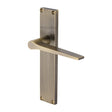 This is an image of a Heritage Brass - Gio Reeded Lever Latch Antique Brass finish, rr4710-at that is available to order from Trade Door Handles in Kendal.