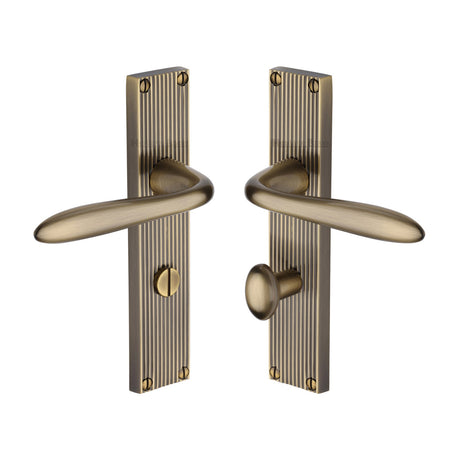 This is an image of a Heritage Brass - Sutton Reeded Bathroom set Antique Brass finish, rr5030-at that is available to order from Trade Door Handles in Kendal.