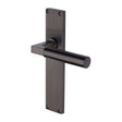 This is an image of a Heritage Brass - Bauhaus Reeded Lever Latch Matt Bronze finish, rr7310-mb that is available to order from Trade Door Handles in Kendal.