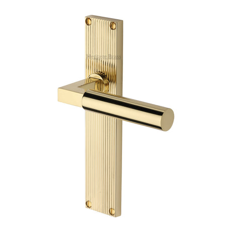 This is an image of a Heritage Brass - Bauhaus Reeded Lever Latch Polished Brass finish, rr7310-pb that is available to order from Trade Door Handles in Kendal.