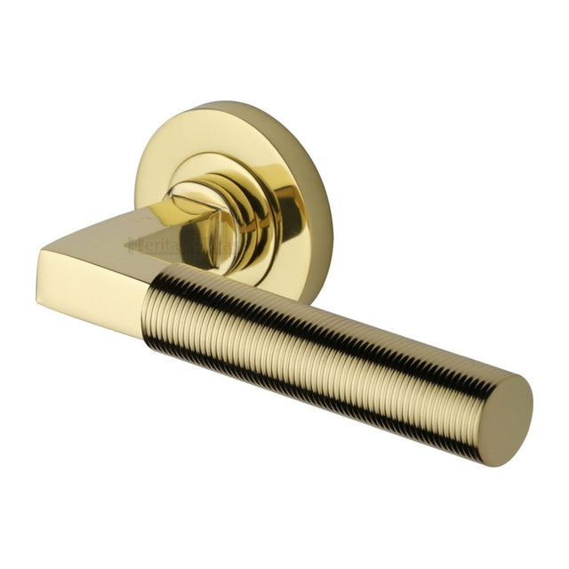 This is an image of a Heritage Brass - Door Handle Lever on Rose Spectral Design Polished Brass Finish, rs2261-pb that is available to order from Trade Door Handles in Kendal.