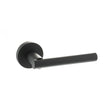 High quality image of STATUS Nebraska Lever on Round Rose - Matt Black | Sku. s28rmb | available to order from Trade Door Handles in Kendal.
