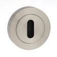 This is an image of STATUS Key Escutcheon on Round Rose - Satin Nickel available to order from Trade Door Handles.