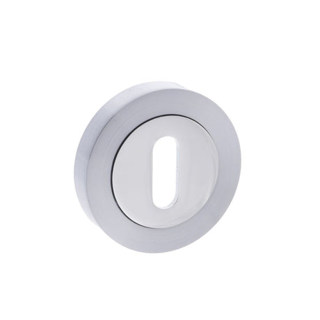 This is an image of STATUS Key Escutcheon on Round Rose - Satin Chrome/Polished Chrome available to order from Trade Door Handles.