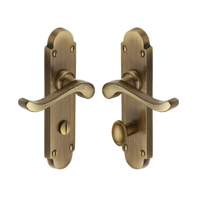 This is an image of a Heritage Brass - Door Handle for Bathroom Savoy Design Antique Brass Finish, s620-at that is available to order from Trade Door Handles in Kendal.