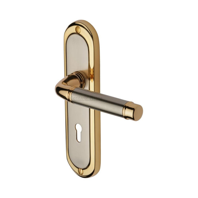 This is an image of a Heritage Brass - Door Handle Lever Lock Saturn Design Jupiter Finish, sat1000-jp that is available to order from Trade Door Handles in Kendal.