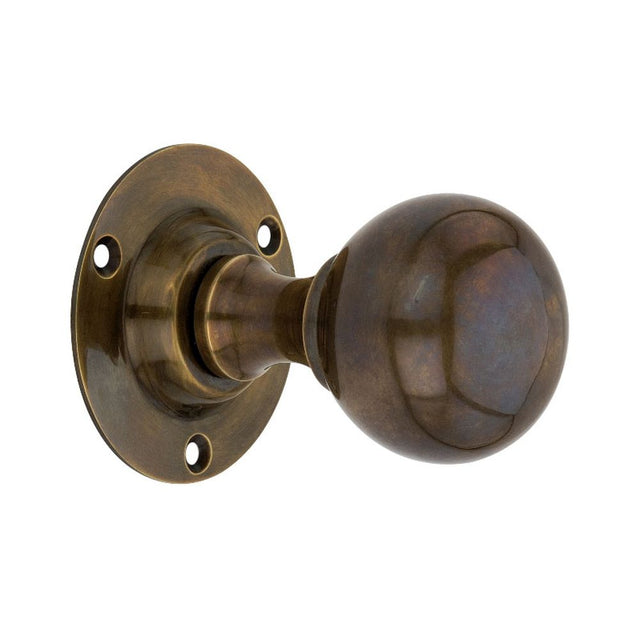 This is an image of Spira Brass - Ball Door Knob Antique   available to order from trade door handles, quick delivery and discounted prices.